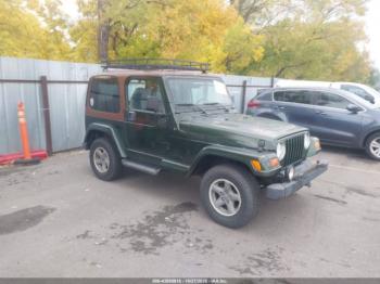  Salvage Jeep Wrangler